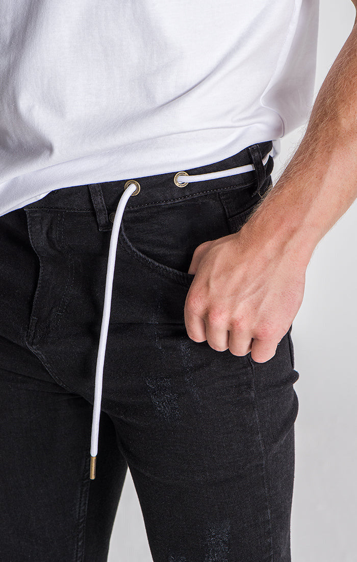 Black Error Skinny Jeans